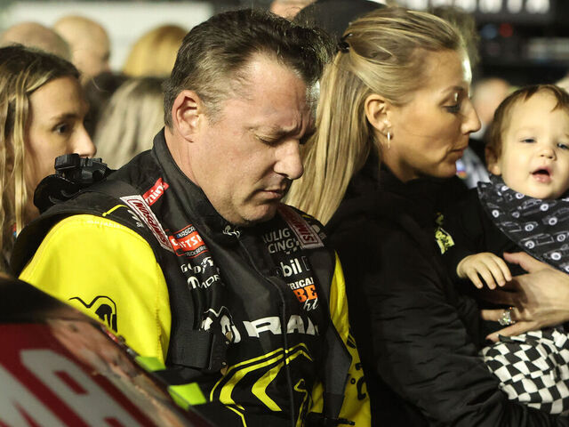 DAYTONA BEACH, FL - FEBRUARY 13: Tony Stewart (#25 Kaulig Racing RAM) stands with his wife Leah and son Dominic prior to the running of the NASCAR Craftsman Truck Series Fresh From Florida 250 on February 13, 2026 at Daytona International Speedway in Daytona Beach, FL.
