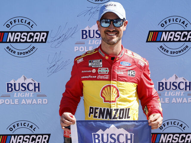 AVONDALE, ARIZONA - MARCH 07: Joey Logano, driver of the #22 Shell Pennzoil Ford, poses for photos after winning the pole award during qualifying for the NASCAR Cup Series Straight Talk Wireless 500 at Phoenix Raceway on March 07, 2026 in Avondale, Arizona.