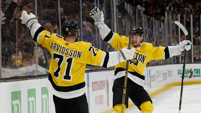 BOSTON, MASSACHUSETTS - MARCH 7: Viktor Arvidsson #71 of the Boston Bruins celebrates his goal against the Washington Capitals with teammate Casey Mittelstadt #11 during the third period at the TD Garden on March 7, 2026 in Boston, Massachusetts.