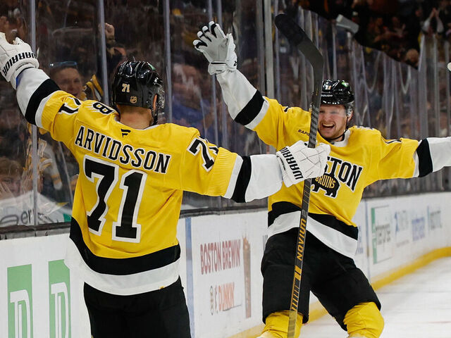 BOSTON, MASSACHUSETTS - MARCH 7: Viktor Arvidsson #71 of the Boston Bruins celebrates his goal against the Washington Capitals with teammate Casey Mittelstadt #11 during the third period at the TD Garden on March 7, 2026 in Boston, Massachusetts.