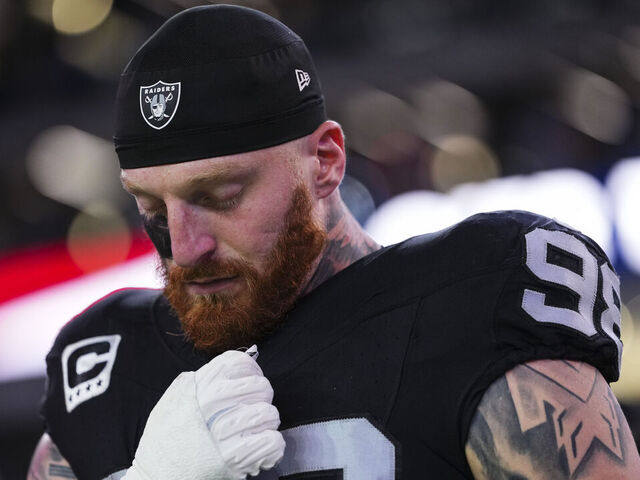 LAS VEGAS, NV - NOVEMBER 17: Maxx Crosby #98 of the Las Vegas Raiders looks on from the sideline during the national anthem prior to an NFL football game against the Dallas Cowboys at Allegiant Stadium on November 17, 2025 in Las Vegas, Nevada.