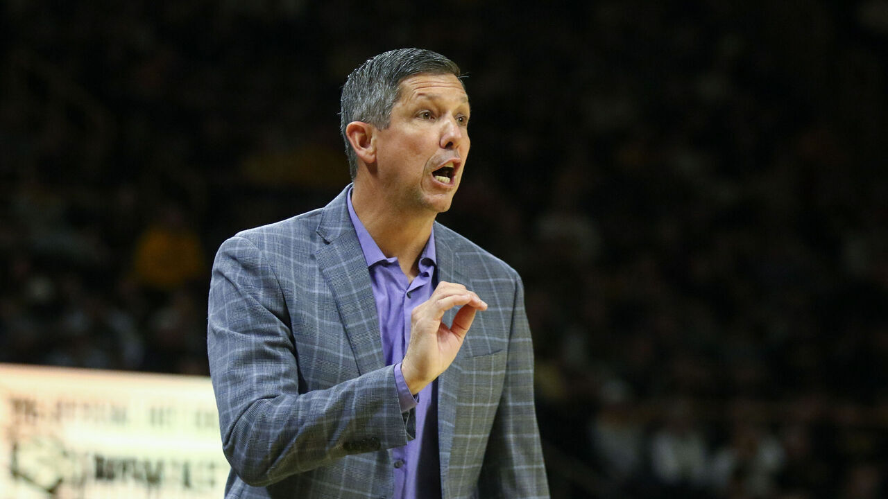 IOWA CITY, IA - NOVEMBER 26: Head coach J.D. Gravina of the Western Illinois Leathernecks talks to his players in the first half against the Iowa Hawkeyes on November 26, 2025 at Carver-Hawkeye Arena, in Iowa City, Iowa.