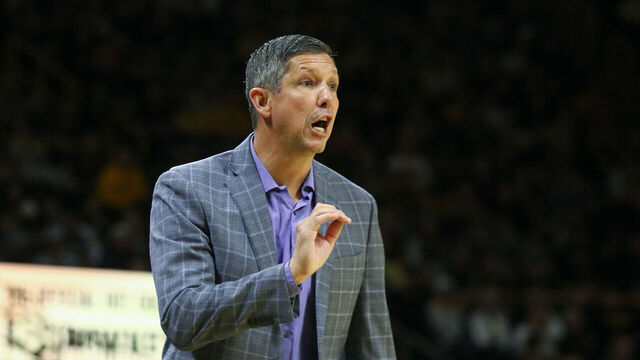 IOWA CITY, IA - NOVEMBER 26: Head coach J.D. Gravina of the Western Illinois Leathernecks talks to his players in the first half against the Iowa Hawkeyes on November 26, 2025 at Carver-Hawkeye Arena, in Iowa City, Iowa.