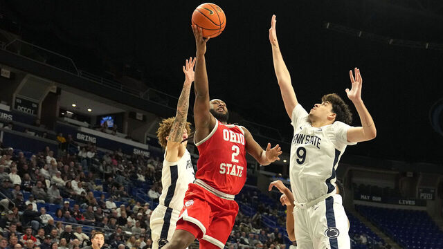 UNIVERSITY, PA- MARCH 04: Bruce Thornton #2 of the Ohio State Buckeyes dries tho the basket between Dominick Stewart #7 and Melih Tunca #9 of the Penn State Nittany Lions in the first half during a college basketball game at the Bryce Jordan Center on March 4, 2026 in University Park, Pennsylvania.