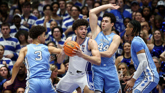 DURHAM, NORTH CAROLINA - MARCH 07: Cameron Boozer #12 of the Duke Blue Devils posts up against the North Carolina Tar Heels during the first half of the game at Cameron Indoor Stadium on March 07, 2026 in Durham, North Carolina.