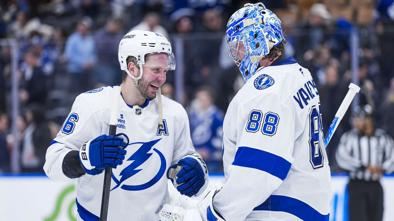 TORONTO, CANADA - MARCH 7: Nikita Kucherov #86 celebrates with Andrei Vasilevskiy #88 of the Tampa Bay Lightning following a win over the Toronto Maple Leafs at the Scotiabank Arena on March 7, 2026 in Toronto, Ontario, Canada.