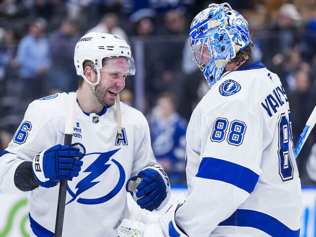 TORONTO, CANADA - MARCH 7: Nikita Kucherov #86 celebrates with Andrei Vasilevskiy #88 of the Tampa Bay Lightning following a win over the Toronto Maple Leafs at the Scotiabank Arena on March 7, 2026 in Toronto, Ontario, Canada.