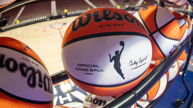 UNCASVILLE, CT - SEPTEMBER 10: A detail view of the WNBA logo on a WNBA official game ball on a rack before a WNBA game between the Atlanta Dream and the Connecticut Sun on September 10, 2025, at Mohegan Sun Arena in Uncasville, CT.