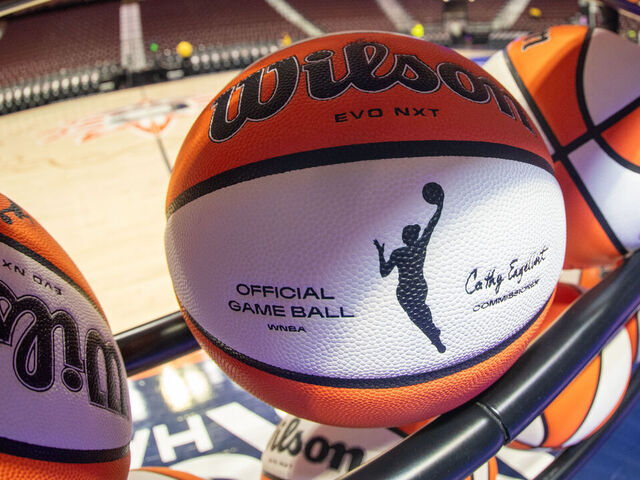 UNCASVILLE, CT - SEPTEMBER 10: A detail view of the WNBA logo on a WNBA official game ball on a rack before a WNBA game between the Atlanta Dream and the Connecticut Sun on September 10, 2025, at Mohegan Sun Arena in Uncasville, CT.
