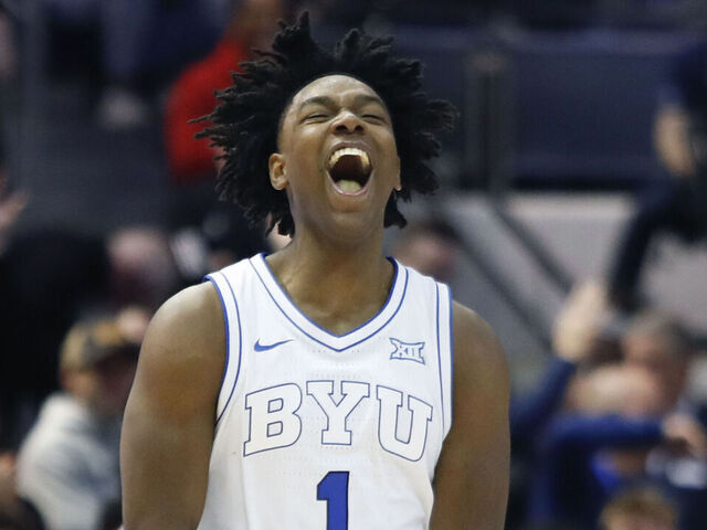 PROVO, UT - MARCH 7: Robert Wright III, #1 of the Brigham Young Cougars reacts as he runs past Donovan Atwell #12 of the Texas Tech Red Raiders during the second half of their game at the Marriott Center on March 7, 2026 in Provo, Utah.