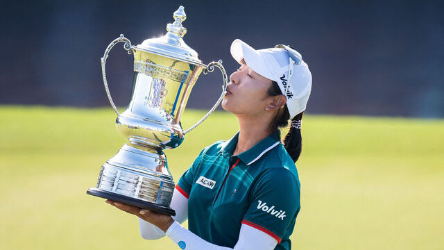 Lee Mi-hyang of South Korea kisses the trophy after winning the 2026 LPGA Blue Bay golf tournament at the Jian Lake Blue Bay Golf Club in Lingshui, on China's southern Hainan island on March 8, 2026. / China OUT