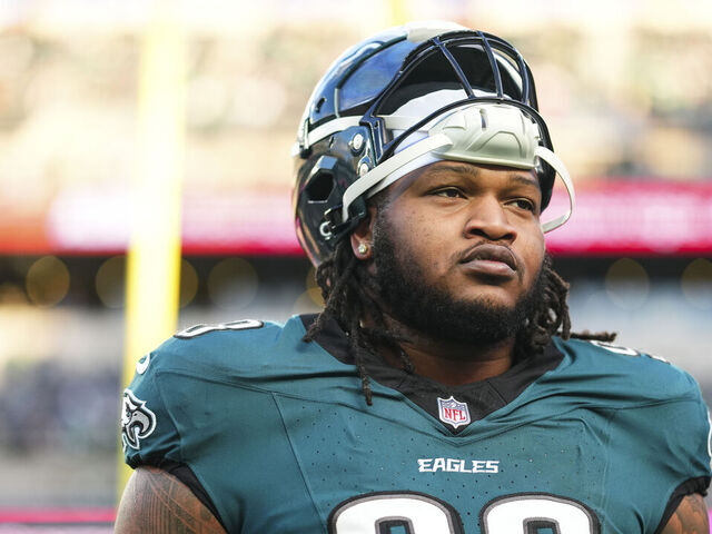 PHILADELPHIA, PA - JANUARY 11: Jalen Carter #98 of the Philadelphia Eagles exits the field after warmups prior to an NFL wild card playoff football game against the San Francisco 49ers at Lincoln Financial Field on January 11, 2026 in Philadelphia, Pennsylvania.