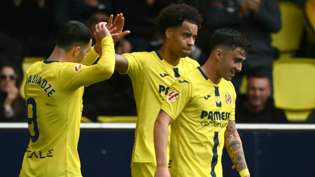 Villarreal's Canadian midfielder #17 Tajon Buchanan (C) celebrates scoring his team's first goal with teammates during the Spanish league football match between Villarreal CF and Elche CF at La Ceramica Stadium in Vila-real on March 8, 2026.