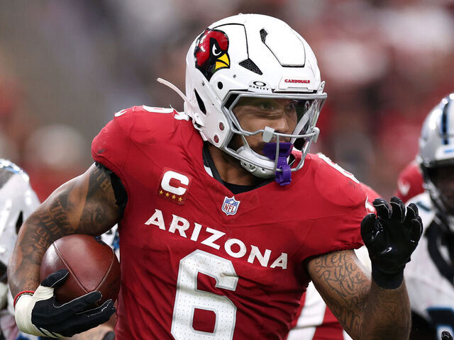 GLENDALE, ARIZONA - SEPTEMBER 14: Running back James Conner #6 of the Arizona Cardinals runs the ball against the Carolina Panthers during the fourth quarter at State Farm Stadium on September 14, 2025 in Glendale, Arizona. The Cardinals defeated the Panthers 27-22.