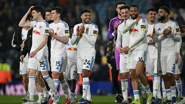 Leeds players celebrate on the pitch after the English FA Cup fifth round football match between Leeds United and Norwich City at Elland Road in Leeds, northern England on March 8, 2026. Leeds won the game 3-0. / RESTRICTED TO EDITORIAL USE. No use with unauthorized audio, video, data, fixture lists, club/league logos or 'live' services. Online in-match use limited to 120 images. An additional 40 images may be used in extra time. No video emulation. Social media in-match use limited to 120 images. An additional 40 images may be used in extra time. No use in betting publications, games or single club/league/player publications. /
