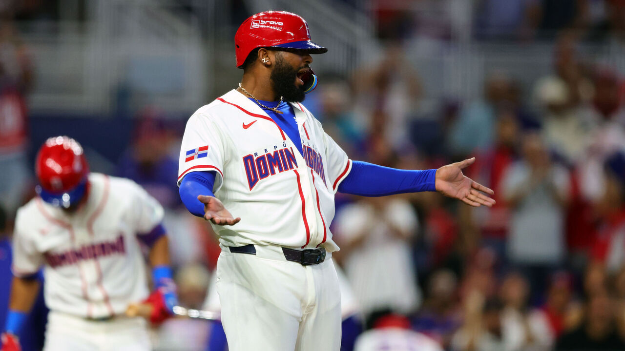 MIAMI, FL - MARCH 08: Junior Caminero #13 of Team Dominican Republic reacts to being hit by a pitch during the 2026 World Baseball Classic Pool D game presented by Capital One between Team Netherlands and Team Dominican Republic at loanDepot park on Sunday, March 8, 2026 in Miami, Florida.