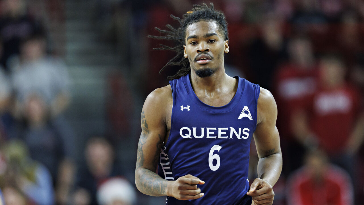 FAYETTEVILLE, ARKANSAS - DECEMBER 16: Avantae Parker #6 of the Queens Royals jogs down the court during a game against the Arkansas Razorbacks at Bud Walton Arena on December 16, 2025 in Fayetteville, Arkansas. The Razorbacks defeated the Royals 108-80.