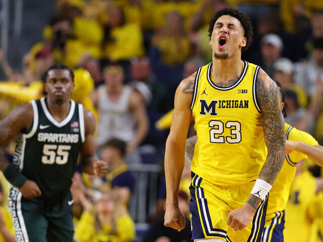 ANN ARBOR, MICHIGAN - MARCH 08: Yaxel Lendeborg #23 of the Michigan Wolverines reacts after a second half three point basket while playing the Michigan State Spartans at Crisler Arena on March 08, 2026 in Ann Arbor, Michigan.