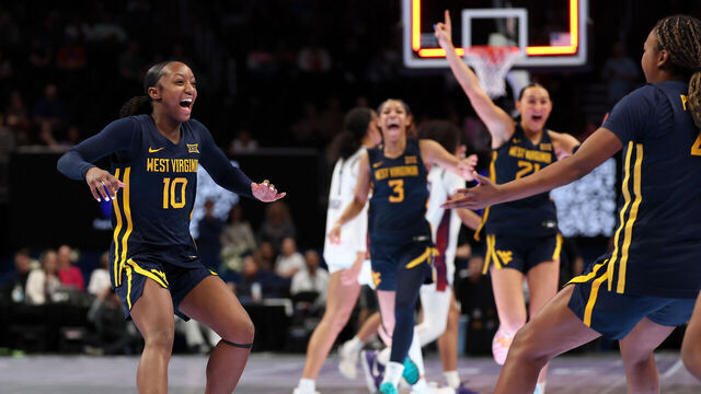 KANSAS CITY, MISSOURI - MARCH 08: Jordan Harrison #10 of the West Virginia Mountaineers celebrates with teammates after the Mountaineers defeated the TCU Horned Frogs to win the championship game of the 2026 Big 12 Women's Tournament at T-Mobile Center on March 08, 2026 in Kansas City, Missouri.