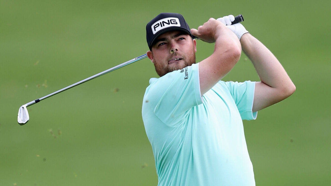 JOHANNESBURG, SOUTH AFRICA - MARCH 08: Dan Bradbury of England looks on following his second shot on the 18th hole on day four of the Joburg Open 2026 at Houghton GC on March 08, 2026 in Johannesburg, South Africa.