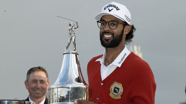 ORLANDO, FLORIDA - MARCH 08: Akshay Bhatia holds up Arnold Palmer Trophy after winning sudden-death playoff against Daniel Berger during the final round of the Arnold Palmer Invitational presented by Mastercard 2026 at Arnold Palmer Bay Hill Golf Course on March 8, 2026 in Orlando, Florida.