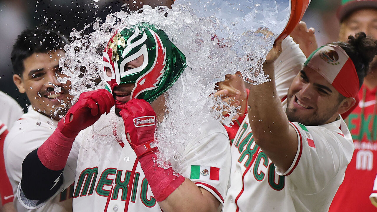 HOUSTON, TEXAS - MARCH 08: Julian Ornelas #31 of Team Mexico is doused with water after hitting the game winning two run home run in the sixth inning against Team Brazil during a 2026 World Baseball Classic Pool B game at Daikin Park on March 08, 2026 in Houston, Texas.