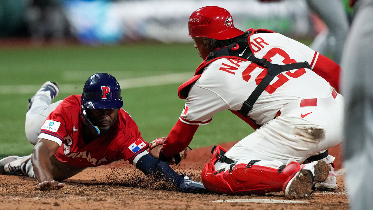 SAN JUAN, PUERTO RICO - MARCH 08: Enrique Bradfield Jr. #2 of Team Panama slides into home plate as Bo Naylor #23 of Team Canada applies the tag for the out in the eighth inning of the 2026 World Baseball Classic Pool A game presented by Capital One between Team Panama and Team Canada at Hiram Bithorn Stadium on Sunday, March 8, 2026 in San Juan, Puerto Rico.