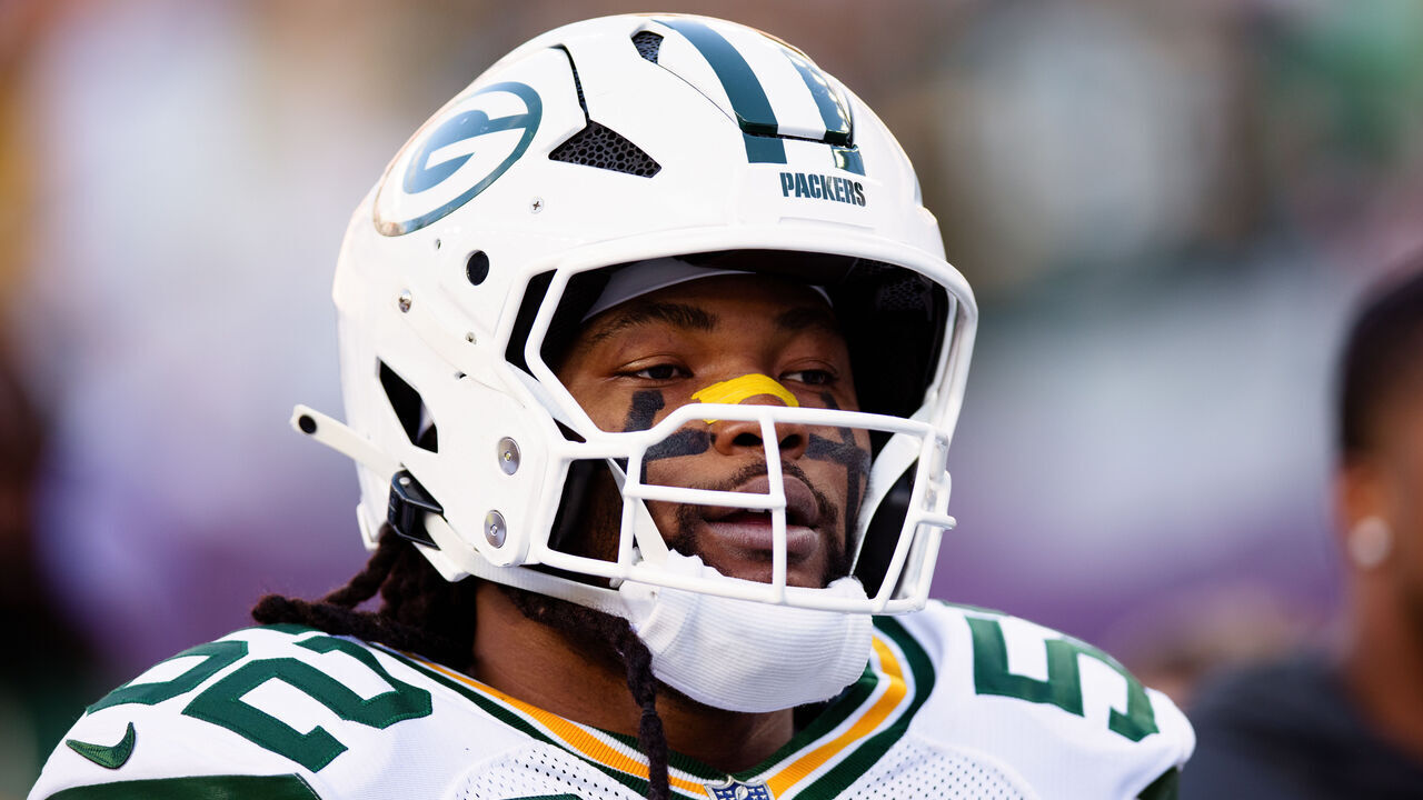 DENVER, CO - DECEMBER 14: Rashan Gary #52 of the Green Bay Packers walks on the field before a game against the Denver Broncos at Empower Field at Mile High on December 14, 2025 in Denver, Colorado.