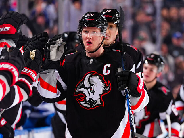 BUFFALO, NEW YORK - MARCH 08: Rasmus Dahlin #26 of the Buffalo Sabres high fives teammates after scoring his team's sixth goal during an NHL game against the Tampa Bay Lightning on March 08, 2026 at KeyBank Center in Buffalo, New York.