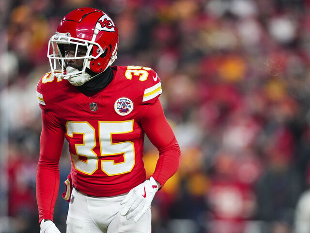 KANSAS CITY, MISSOURI - DECEMBER 07: Jaylen Watson #35 of the Kansas City Chiefs looks on from the field during an NFL football game against the Houston Texans at GEHA Field at Arrowhead Stadium on December 7, 2025 in Kansas City, Missouri.