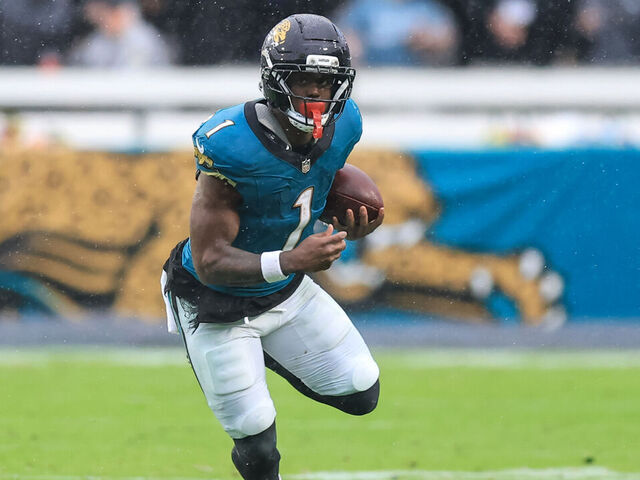 JACKSONVILLE, FLORIDA - DECEMBER 7: Travis Etienne #1 of the Jacksonville Jaguars runs against the Indianapolis Colts at EverBank Field on December 7, 2025 in Jacksonville, Florida.