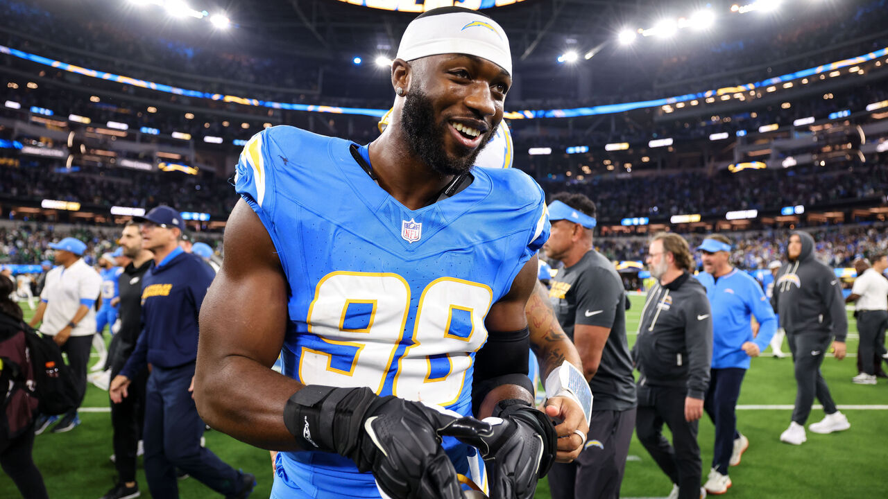 INGLEWOOD, CALIFORNIA - DECEMBER 8: Odafe Oweh #98 of the Los Angeles Chargers celebrates after winning the game against the Philadelphia Eagles at SoFi Stadium on December 8, 2025 in Inglewood, California.
