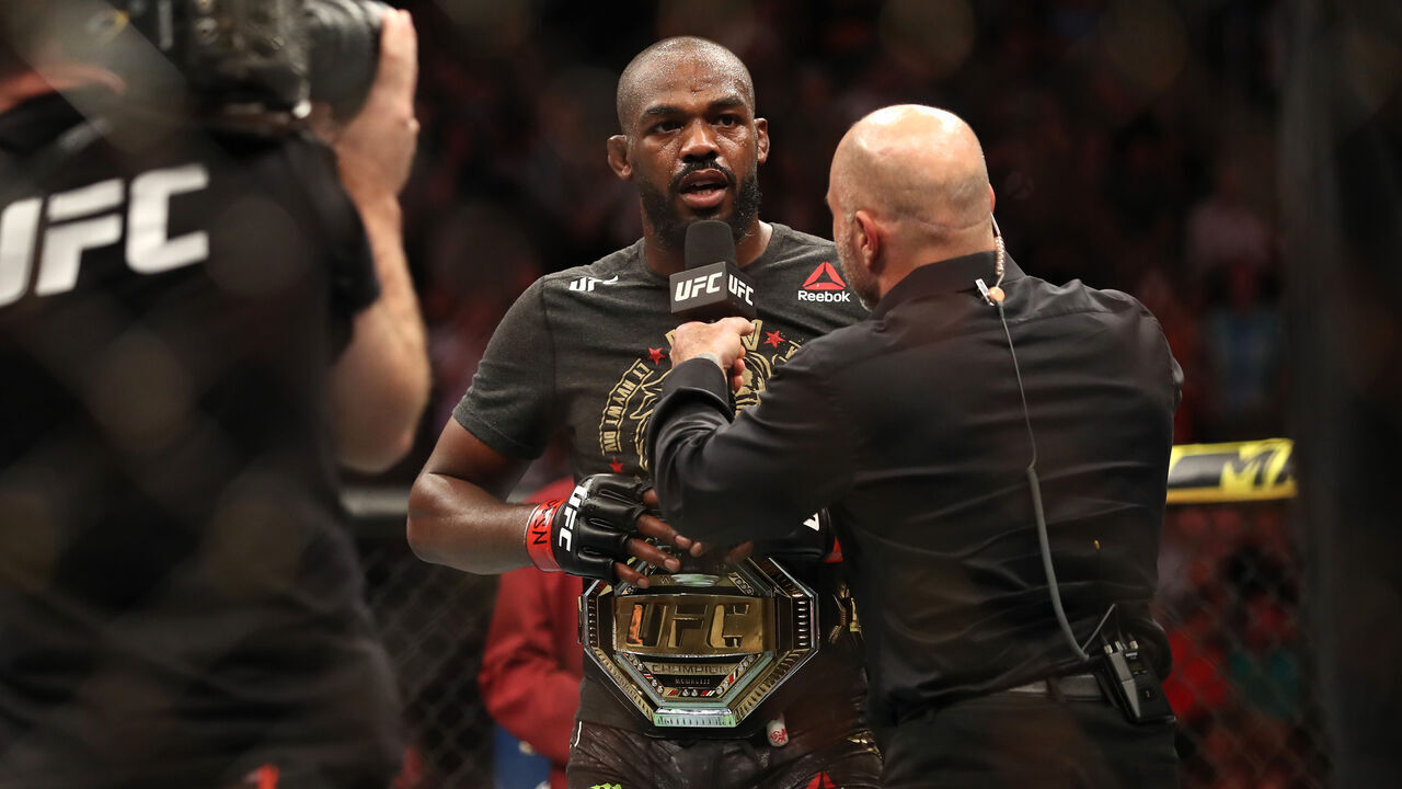 LAS VEGAS, NEVADA - JULY 06: Jon Jones of the United States talks with President of the Ultimate Fighting Championship Dana White after defeating Thiago Santos of Brazil during their UFC Light Heavyweight Title bout at T-Mobile Arena on July 06, 2019 in Las Vegas, Nevada.