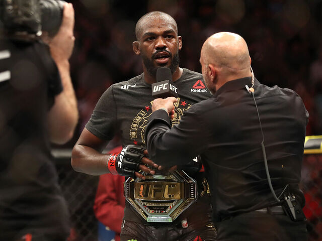 LAS VEGAS, NEVADA - JULY 06: Jon Jones of the United States talks with President of the Ultimate Fighting Championship Dana White after defeating Thiago Santos of Brazil during their UFC Light Heavyweight Title bout at T-Mobile Arena on July 06, 2019 in Las Vegas, Nevada.