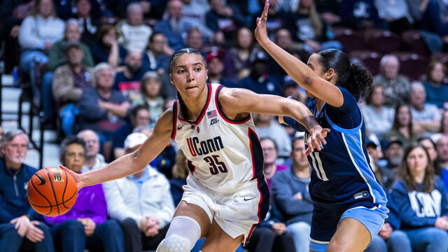 UNCASVILLE, CONNECTICUT - MARCH 09: Azzi Fudd #35 of the Connecticut Huskies is defended by Jasmine Bascoe #11 of the Villanova Wildcats in the first half of the championship game of the Big East Women’s Basketball Tournament at Mohegan Sun on March 09, 2026 in Uncasville, Connecticut.