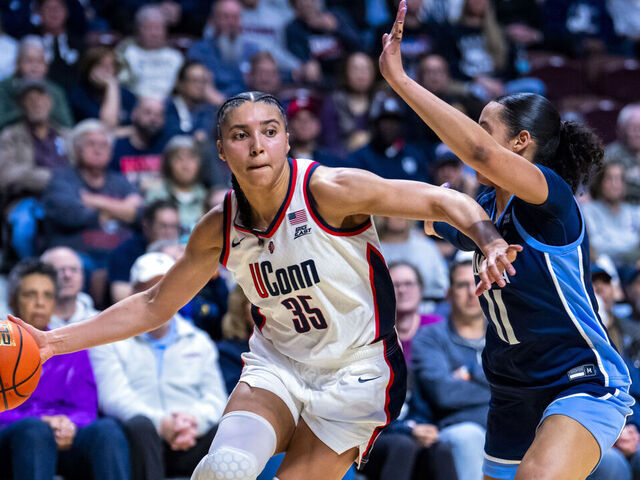 UNCASVILLE, CONNECTICUT - MARCH 09: Azzi Fudd #35 of the Connecticut Huskies is defended by Jasmine Bascoe #11 of the Villanova Wildcats in the first half of the championship game of the Big East Women’s Basketball Tournament at Mohegan Sun on March 09, 2026 in Uncasville, Connecticut.