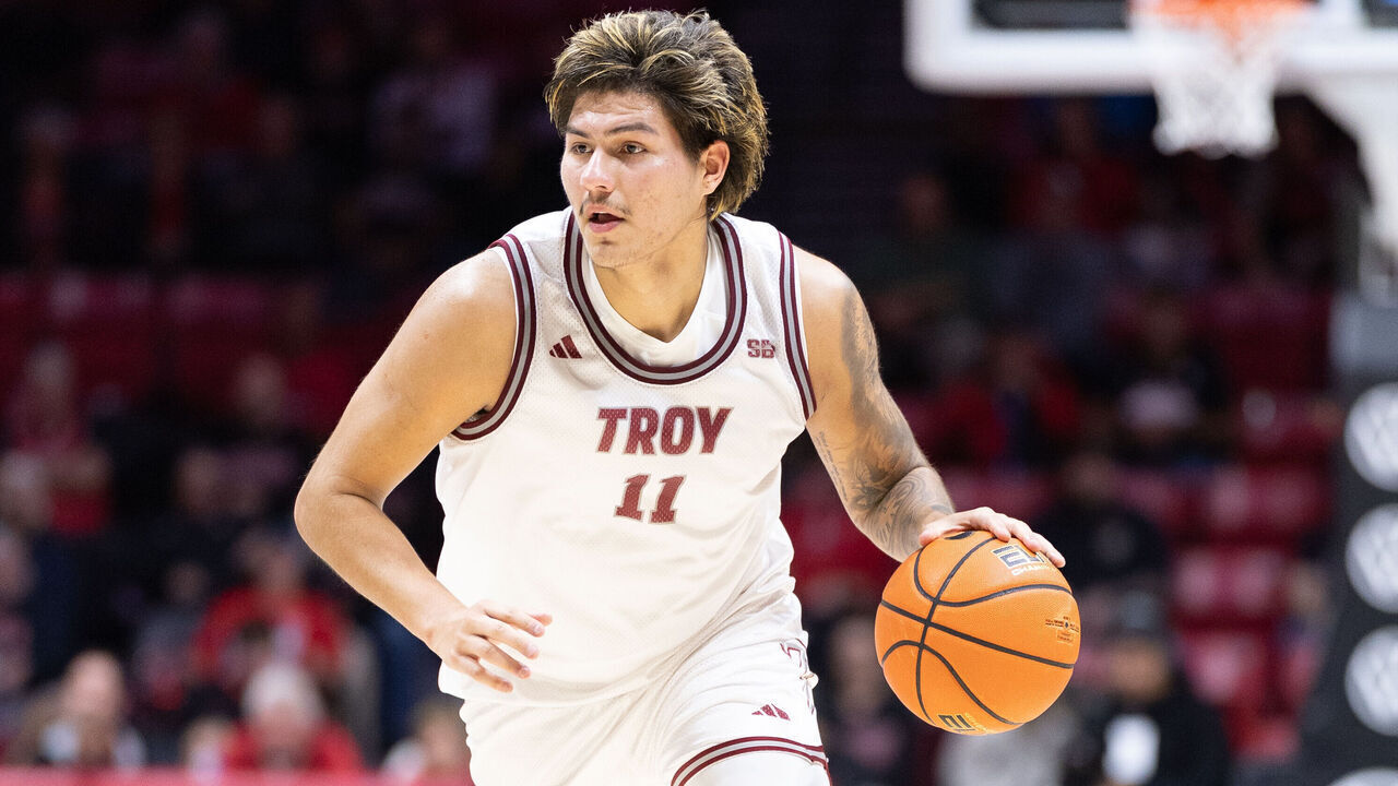SAN DIEGO, CA - NOVEMBER 18: Troy forward Victor Valdes (11) dribbles the ball during a college basketball game between the Troy Trojans and the San Diego State Aztecs on November 18, 2025, at Viejas Arena in San Diego, CA.