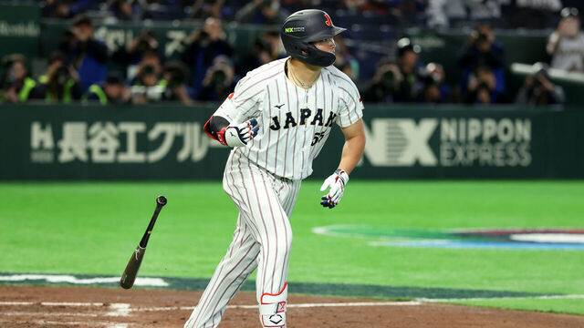 TOKYO, JAPAN - MARCH 10: Munetaka Murakami #55 of Team Japan tosses his bat after hitting a grand slam in the eighth inning during the 2026 World Baseball Classic Pool C game between Czechia and Japan at Tokyo Dome on March 10, 2026 in Tokyo, Japan.