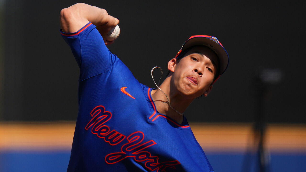 PORT ST. LUCIE, FLORIDA - FEBRUARY 13: Jonah Tong #21 of the New York Mets throws a pitch during spring training workouts at Clover Park on February 13, 2026 in Port St. Lucie, Florida.