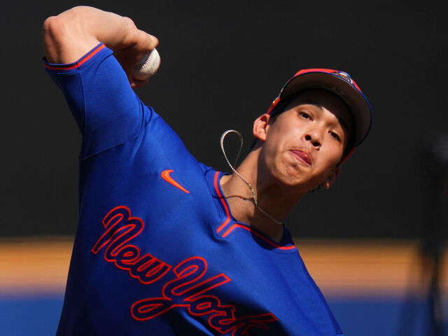 PORT ST. LUCIE, FLORIDA - FEBRUARY 13: Jonah Tong #21 of the New York Mets throws a pitch during spring training workouts at Clover Park on February 13, 2026 in Port St. Lucie, Florida.
