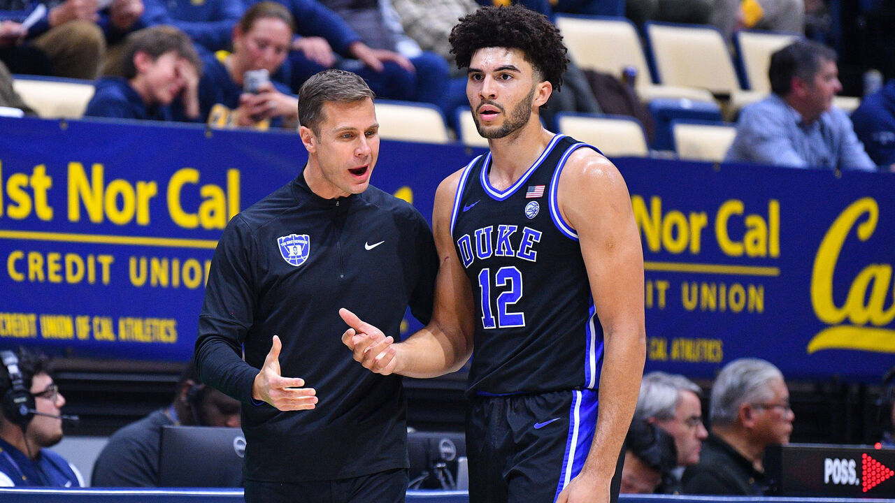 BERKELEY, CA - JANUARY 14: Duke Blue Devils head coach Jon Scheyer talks with Duke Blue Devils forward Cameron Boozer (12) during the college basketball game between the Duke Blue Devils and the California Golden Bears on January 14, 2026 at Haas Pavilion in Berkeley, CA.