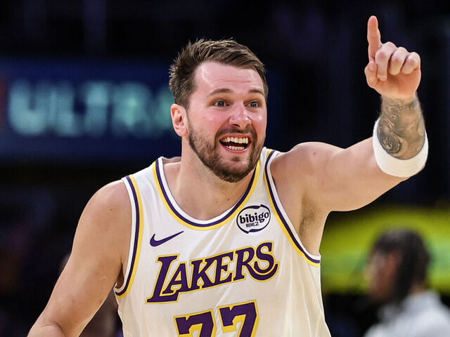 Los Angeles, CA, Sunday, March 8, 2026 - Los Angeles Lakers guard Luka Doncic (77) yells out to a teammate as he celebrates after hitting a difficult three pointer against the the New York Knicks at Crypto.com Arena. (Robert Gauthier/Los Angeles Times via Getty Images)