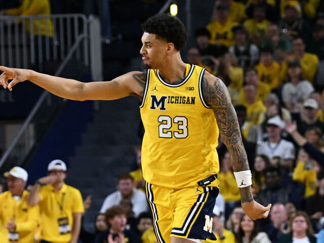 ANN ARBOR, MI - MARCH 08: Michigan Wolverines forward Yaxel Lendeborg (23) celebrates a three point shot during the Michigan Wolverines versus the Michigan State Spartans game on Sunday March 8, 2026 at Crisler Arena in Ann Arbor, MI.