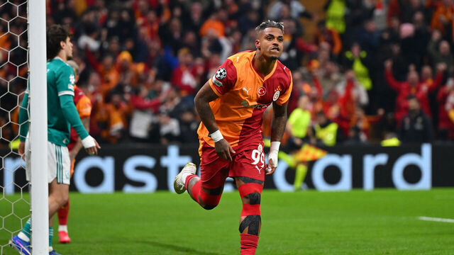 Galatasaray's Gabonese midfielder #99 Mario Lemina celebrates after scoring the opening goal during the UEFA Champions League round of 16 first leg football match between Galatasaray SK and Liverpool FC at the Ali Sami Yen Sports Complex in Istanbul on March 10, 2026.