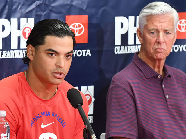 CLEARWATER, FLORIDA - MARCH 10: Jesús Luzardo #44 of the Philadelphia Phillies and Dave Dombrowski, President of Baseball Operations, speak with reporters about Luzardo's five-year, $135M contract extension before a spring training game against the New York Yankees at BayCare Ballpark on March 10, 2026 in Clearwater, Florida.