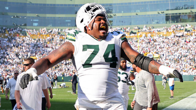GREEN BAY, WISCONSIN - OCTOBER 20: Elgton Jenkins #74 of the Green Bay Packers celebrates after beating the Houston Texans 24-22 at Lambeau Field on October 20, 2024 in Green Bay, Wisconsin.