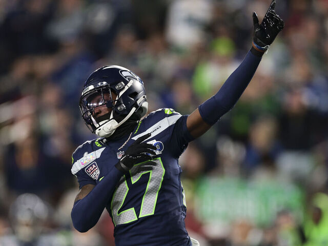 SANTA CLARA, CALIFORNIA - FEBRUARY 08: Riq Woolen #27 of the Seattle Seahawks reacts to a defensive stop against the New England Patriots during the second half of the Super Bowl LX at Levi's Stadium on February 08, 2026 in Santa Clara, California.