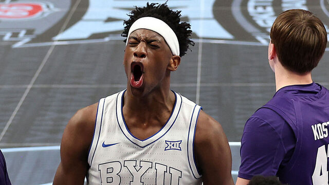KANSAS CITY, MISSOURI - MARCH 10: AJ Dybantsa #3 of the BYU Cougars reacts after scoring during the first round game of the Men's 2026 Big 12 Tournament against the Kansas State Wildcats at T-Mobile Center on March 10, 2026 in Kansas City, Missouri.