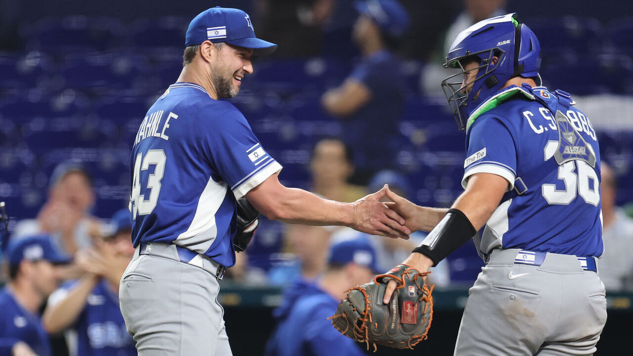 MIAMI, FLORIDA - MARCH 10: Tommy Kahnle #43 of the Israel celebrates getting out of the eighth inning with C.J. Stubbs #36 against the Kingdom of the Netherlands at loanDepot park on March 10, 2026 in Miami, Florida.