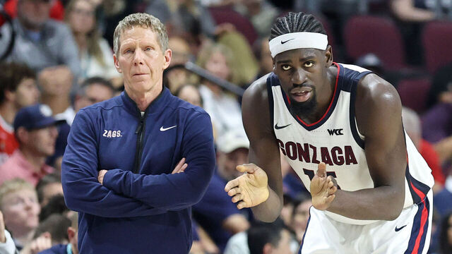 LAS VEGAS, NEVADA - MARCH 09: Head coach Mark Few and Graham Ike #15 of the Gonzaga Bulldogs talk during a stop in play in the first half of the championship game of the West Coast Conference men's basketball tournament against the Santa Clara Broncos at the Orleans Arena on March 09, 2026 in Las Vegas, Nevada.